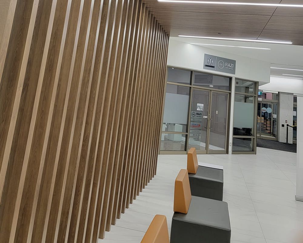 desk and main entrance to office building slot wall and ceiling panels #2