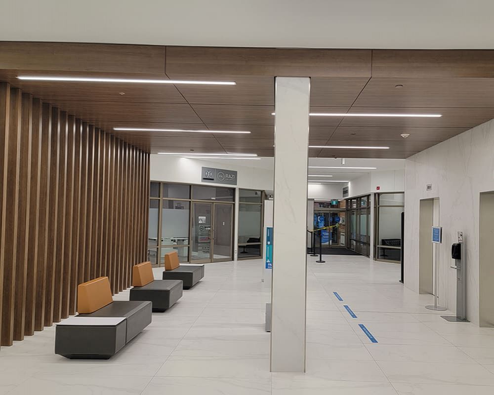 desk and main entrance to office building slot wall and ceiling panels #4